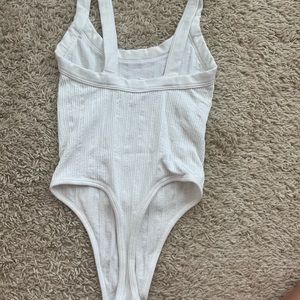 Out from under bodysuit